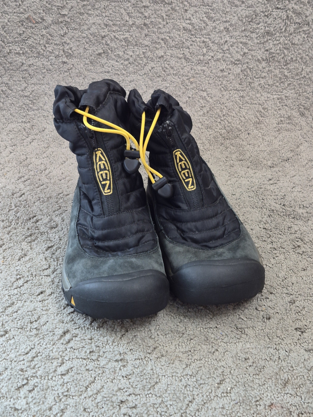 KEEN Kids Black and Yellow Winter Slip-On Boots